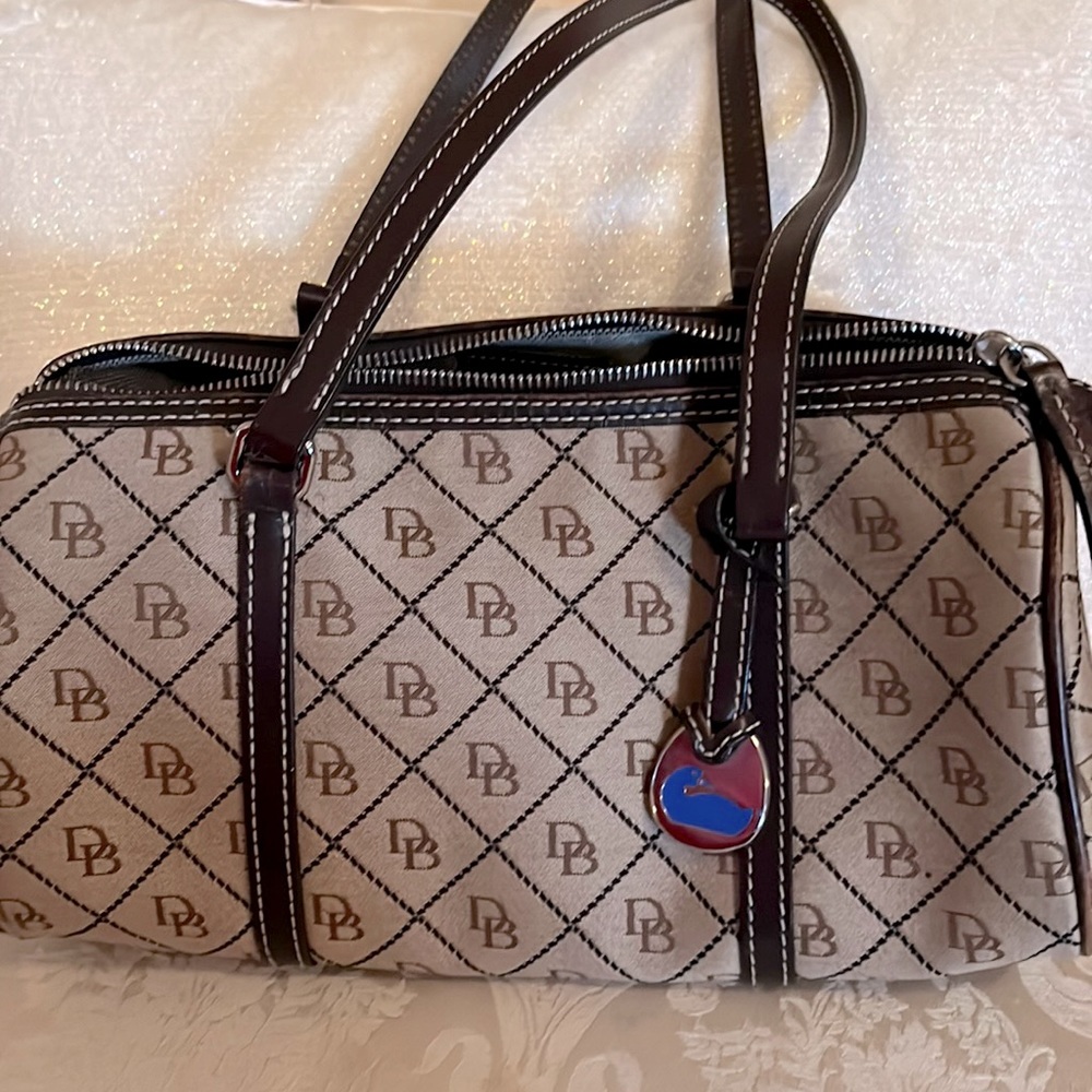 Vintage Dooney barrel shaped bag.